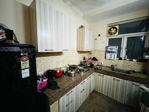 Kitchen in 4 BHK Apartment at Raheja Sampada, Sector 92 – for Sale