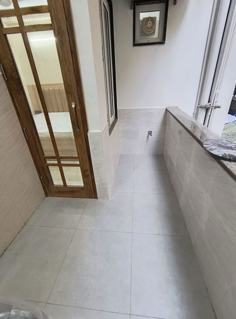 Balcony, sector 27 2 Bedroom 900 Sq.Ft. Builder Floor In Sector 27 Gurgaon 10576550