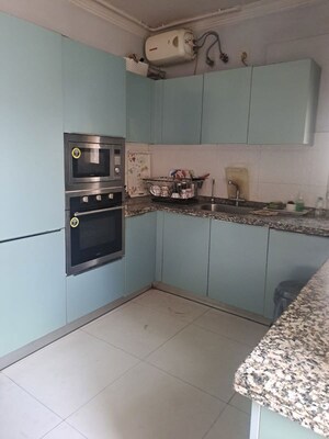 Kitchen in 3.5 BHK Apartment at Panchsheel Enclave – for Rent