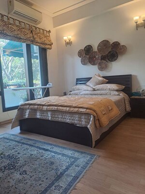 Bedroom in 3.5 BHK Apartment at Panchsheel Enclave – for Rent