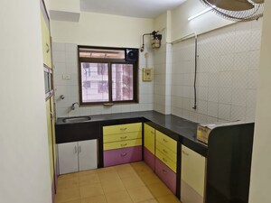 Kitchen in 2 BHK Apartment at Runwal Regency, Majiwada – for Rent