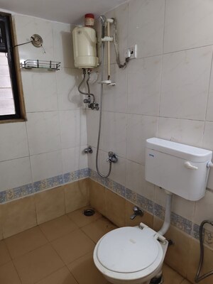 Bathroom in 2 BHK Apartment at Runwal Regency, Majiwada – for Rent