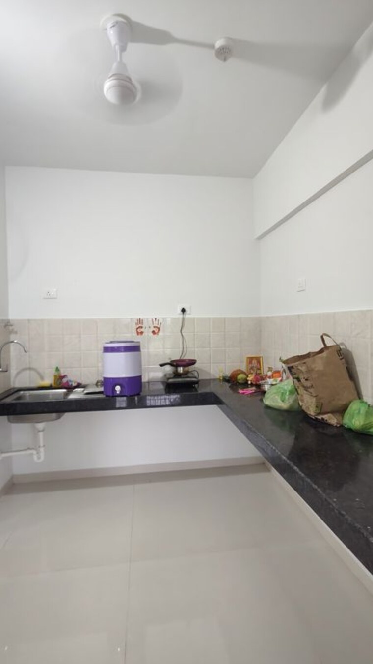 Kitchen, shapoorji-pallonji-joyville-hinjewadi 2 Bedroom 750 Sq.Ft. Apartment In Hinjewadi Pune 10576911