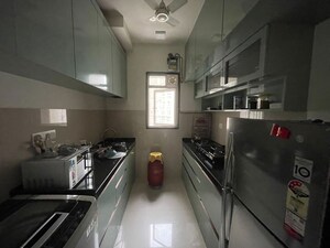 Kitchen in 2 BHK Apartment at Runwal Nirvana, Parel – for Rent