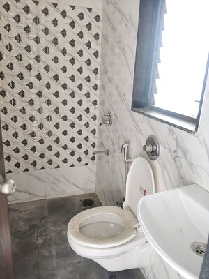Bathroom in 2 BHK Apartment at UK Iridium, Kandivali East – for Rent