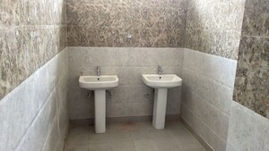Bathroom in  Office Space at Sector 156 – for Rent
