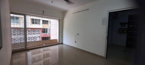 Living Room in 1 BHK Apartment at Prathamesh Azad Nagar Shubham CHSL, Andheri West – for Sale