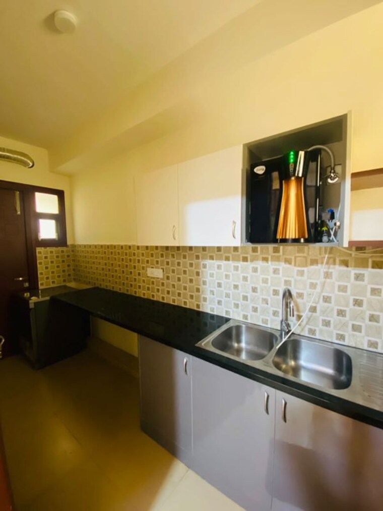 Kitchen, nambiar-belleza 4 Bedroom 4200 Sq.Ft. Villa In Sarjapur Bangalore 10519249