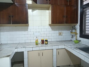 Kitchen in 2 BHK Apartment at The Shri Ganesh CGHS, Sector 56 – for Rent