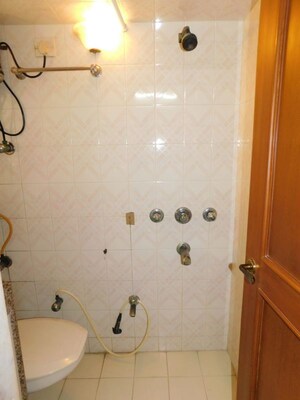 Bathroom in 2 BHK Apartment at Benhur CHS LTD, Andheri West – for Rent
