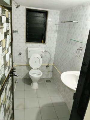 Bathroom in 1 BHK Apartment at Railway Chawl – for Rent