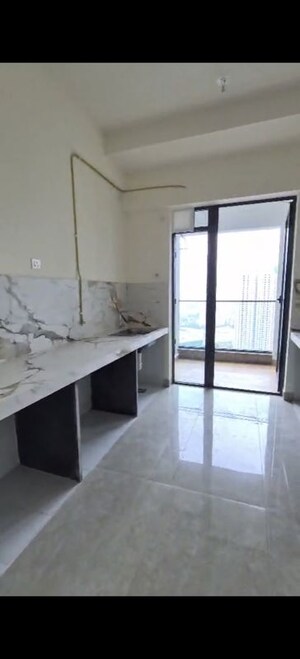 Kitchen in 4 BHK Apartment at Raymond The Address, Pokhran Road No Two – for Rent