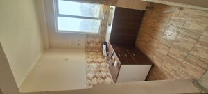 Kitchen in 2.5 BHK Apartment at Amrapali Kingswood, Sector 4 Greater Noida – for Sale