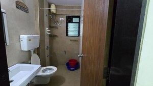 Bathroom in 2 BHK Apartment at Runwal Pearl, Manpada – for Rent