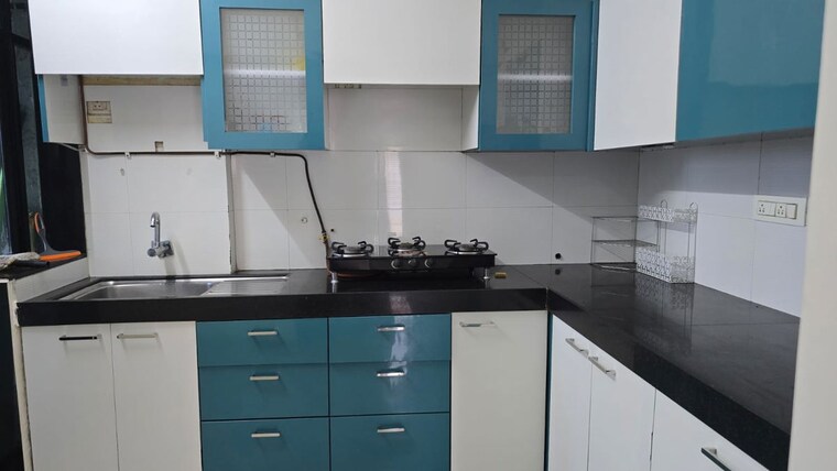 Kitchen, runwal-pearl 2 Bedroom 950 Sq.Ft. Apartment In Manpada Thane 10577262