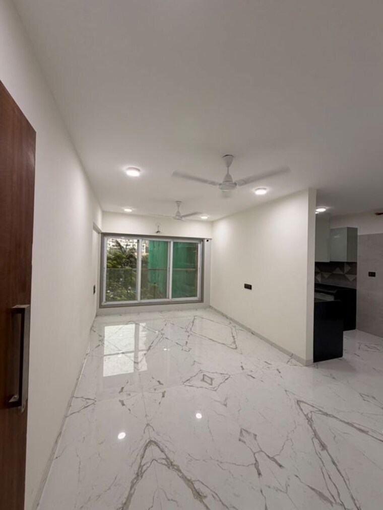 Living Room, alpine-primo 2 Bedroom 610 Sq.Ft. Apartment In Andheri West Mumbai 10577301