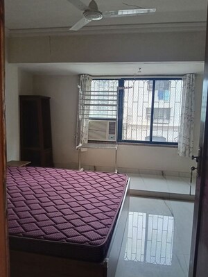 Bedroom in 3 BHK Apartment at Lokhandwala Complex – for Rent