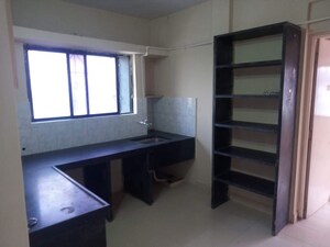 Kitchen in 1 BHK Apartment at Bhusari Colony – for Sale