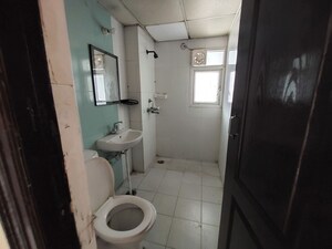 Bathroom in 2.5 BHK Apartment at Saviour Park, Mohan Nagar – for Rent