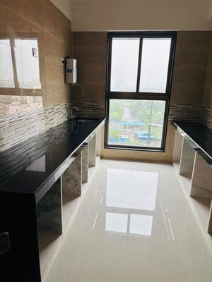 Kitchen in 2 BHK Apartment at Raj Infinia, Malad West – for Rent