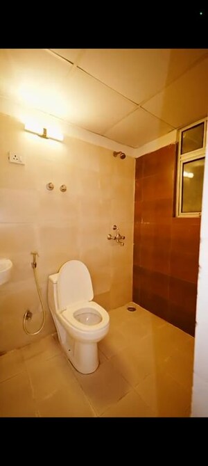 Bathroom in 2 BHK Apartment at Uninav Heights Phase I, Raj Nagar Extension – for Sale