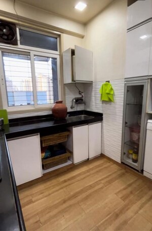 Kitchen in 3 BHK Apartment at Hiranandani Woodville, Ghodbunder Road – for Sale