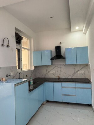 Kitchen in 3 BHK Builder Floor at Motia Blue Ridge, Dhakoli – for Sale