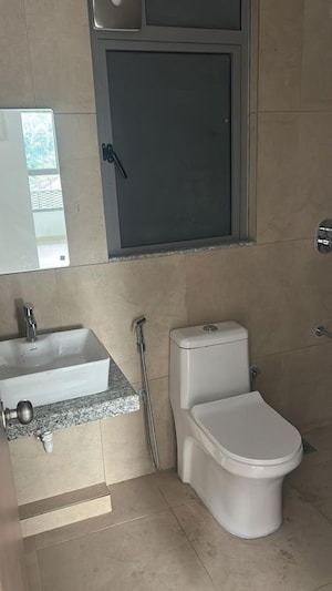 Bathroom in 2 BHK Apartment at Kalpataru Immensa, Kolshet Road – for Rent