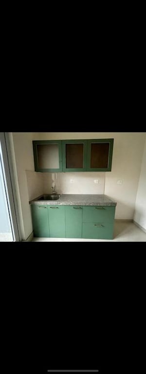 Kitchen in 2 BHK Apartment at Piramal Vaikunth, Balkum Pada – for Rent