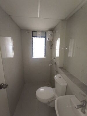 Bathroom in 1 BHK Apartment at Runwal Gardens, Dombivli East – for Rent