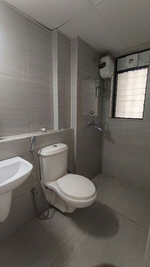 Bathroom in 1 BHK Apartment at Runwal Gardens, Dombivli East – for Rent