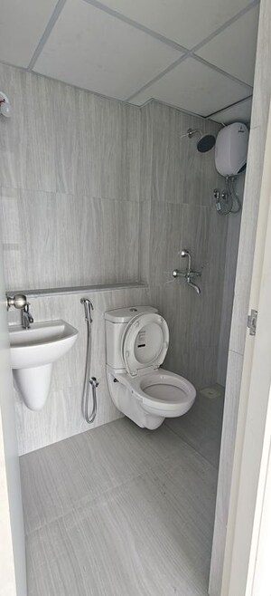 Bathroom in 2 BHK Apartment at Runwal Gardens, Dombivli East – for Rent