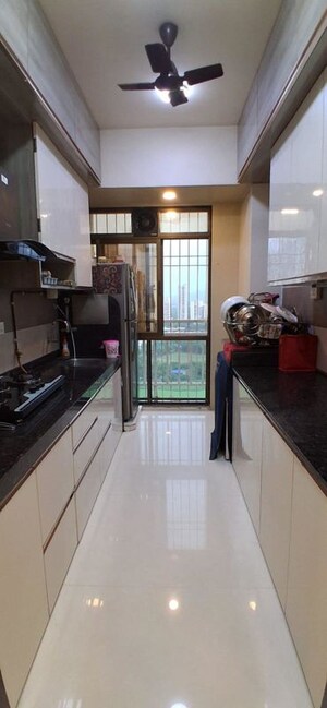 Kitchen in 3 BHK Apartment at Gami Reagan, Ghansoli – for Rent