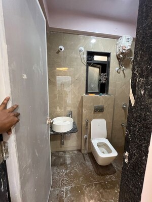 Bathroom in 1 BHK Apartment at Damji Shamji Mahavir Spring Tulip Phase 1, Pokhran Road No Two – for Rent