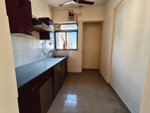 Kitchen in 2 BHK Apartment at Puranik City Phase III, Ghodbunder Road – for Rent
