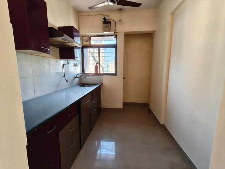 Kitchen, puranik-city-phase-iii 2 Bedroom 520 Sq.Ft. Apartment In Ghodbunder Road Thane 10577746