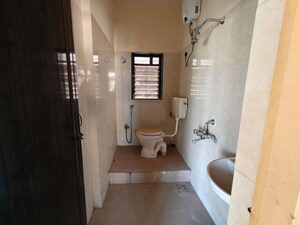 Bathroom in 2 BHK Apartment at Puranik City Phase III, Ghodbunder Road – for Rent