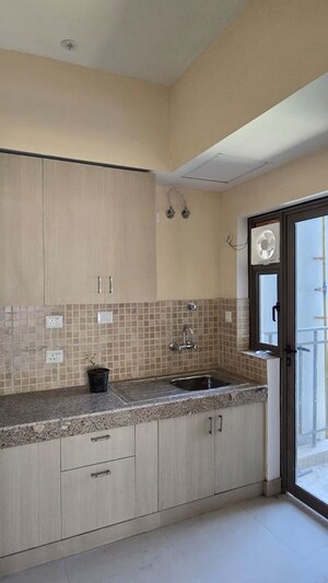 Kitchen in 2 BHK Apartment at Paras Dews, Sector 106 – for Rent