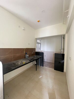Kitchen in 2 BHK Apartment at Kolte Patil Life Republic Arezo, Hinjewadi – for Rent
