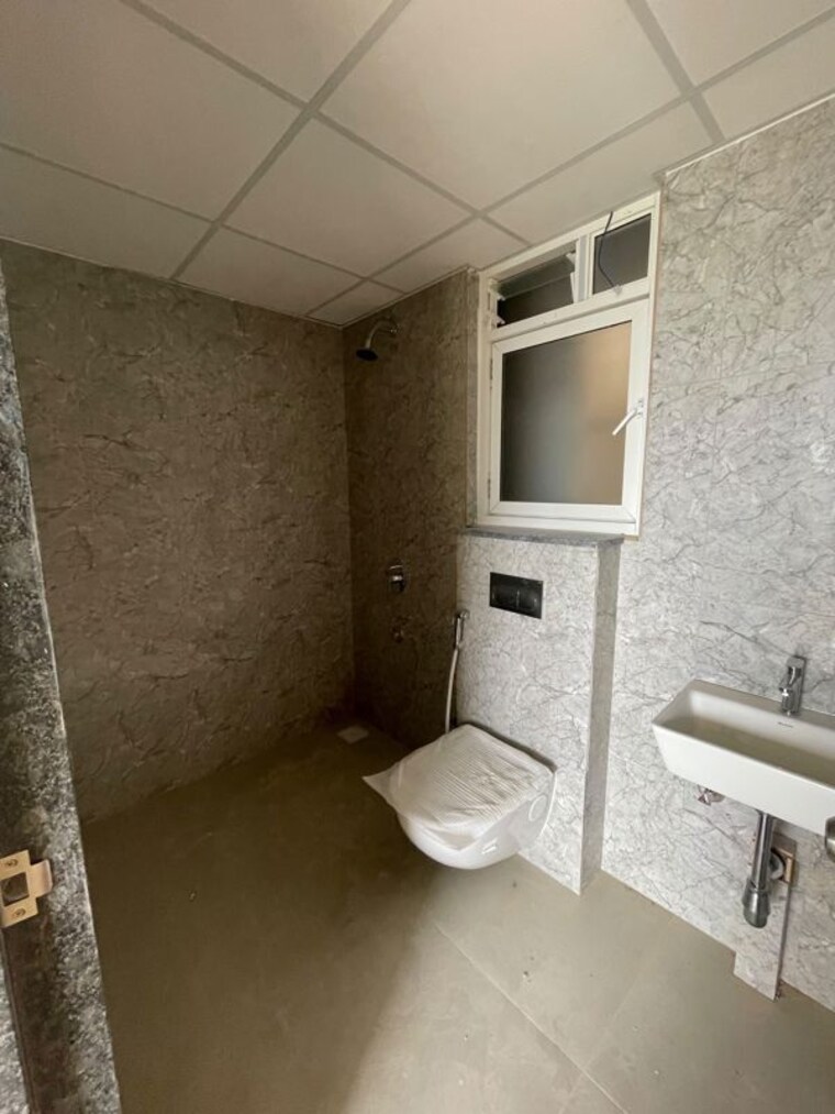 Bathroom, kolte-patil-life-republic-arezo 2 Bedroom 738 Sq.Ft. Apartment In Hinjewadi Pune 10577754