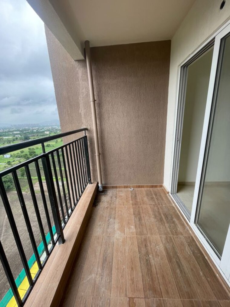 Balcony, kolte-patil-life-republic-arezo 2 Bedroom 738 Sq.Ft. Apartment In Hinjewadi Pune 10577754