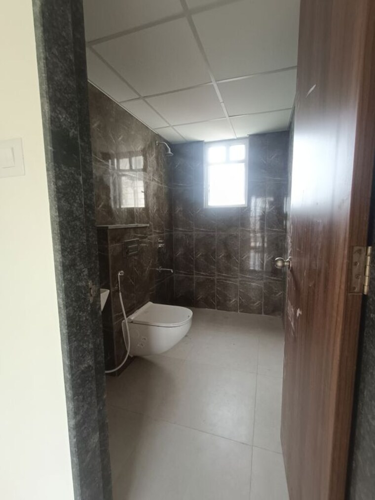 Bathroom, kolte-patil-life-republic-arezo 2 Bedroom 850 Sq.Ft. Apartment In Hinjewadi Pune 10577773