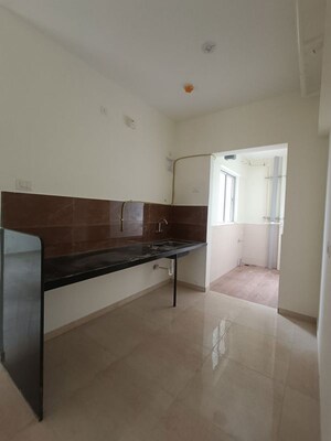 Kitchen in 2 BHK Apartment at Kolte Patil Life Republic Arezo, Hinjewadi – for Rent