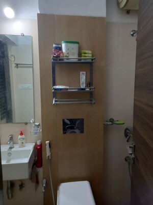 Bathroom in 1 BHK Apartment at Kanakia Rainforest, Andheri East – for Rent