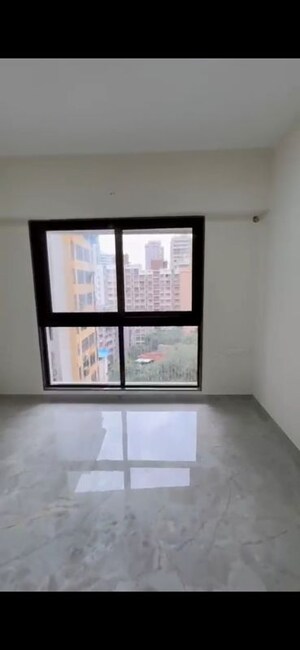 Bedroom in 1 BHK Apartment at Ajmera Boulevard, Malad West – for Sale