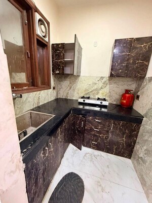Kitchen in 1 BHK Apartment at Freedom Fighters Enclave – for Rent