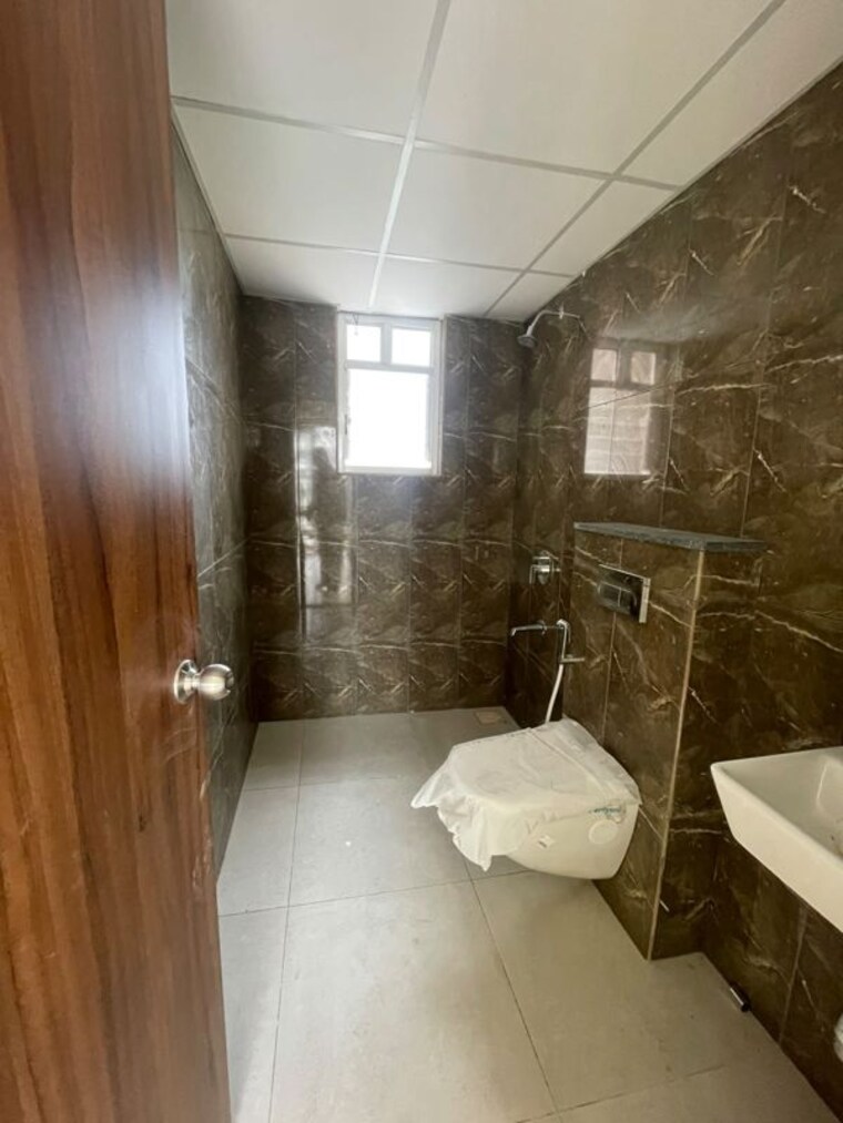 Bathroom, kolte-patil-life-republic-16th-avenue-arezo 2 Bedroom 780 Sq.Ft. Apartment In Hinjewadi Pune 10577869