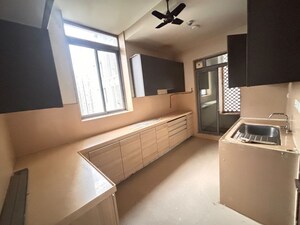 Kitchen in 3 BHK Apartment at Piramal Vaikunth, Balkum Pada – for Rent
