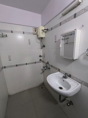 Bathroom in 2 BHK Apartment at Harshail Flamingo Apartments, Malad West – for Rent