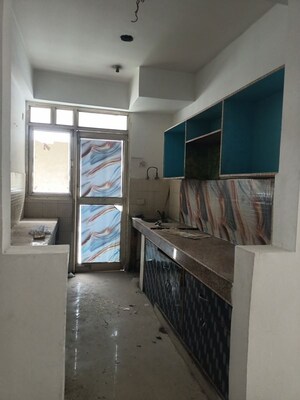 Kitchen in 2 BHK Apartment at GH-7 Crossings Republik, Vijay Nagar – for Rent